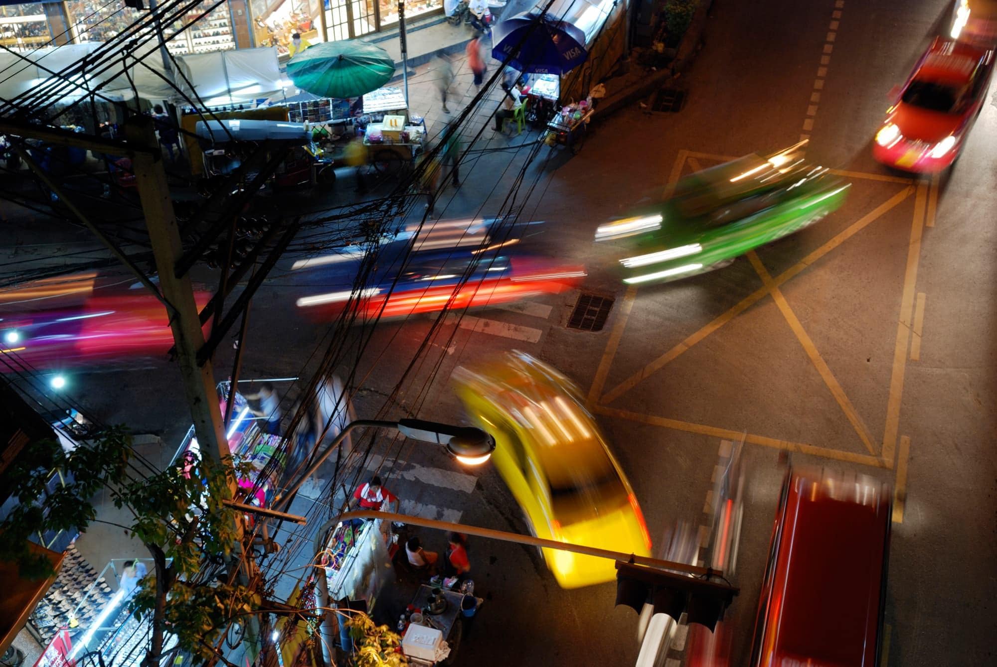 Public Security and Safety Solutions Aerial view of cars driving at night
